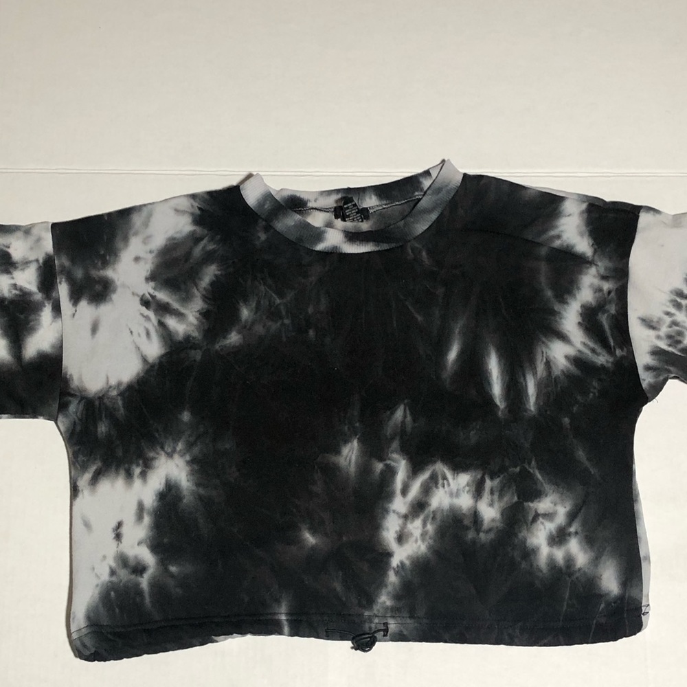 A cute black and white crop top shirt from rue 21